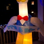 The Stork on our Porch lit up.