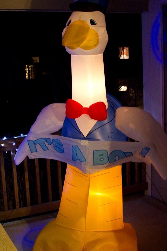 The Stork on our Porch lit up.
