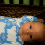 Eli chillin in his crib