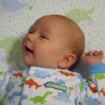 Eli smiling and wiggling