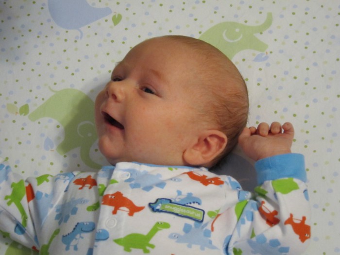 Eli smiling and wiggling