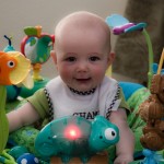 Eli Playing In His Exersaucer