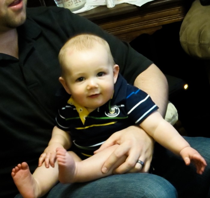 Eli Sits On Dad's Lap