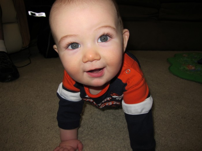 Eli Crawling and Smiling For the Camera