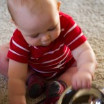 Eli Playing with the Metal Bowls