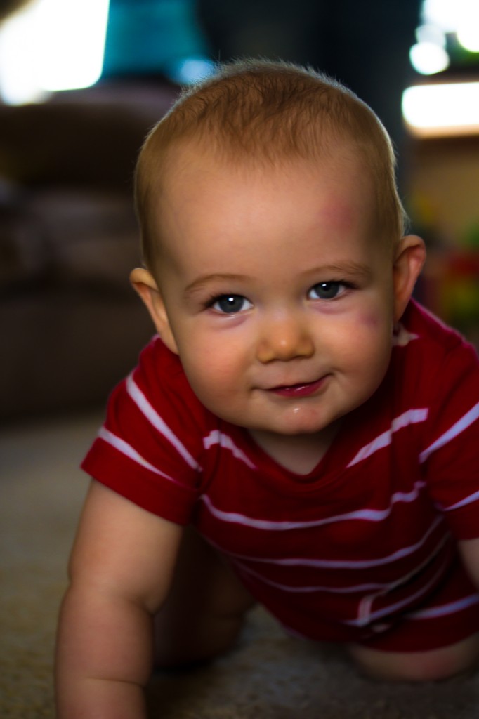 The smile of happy boy playing
