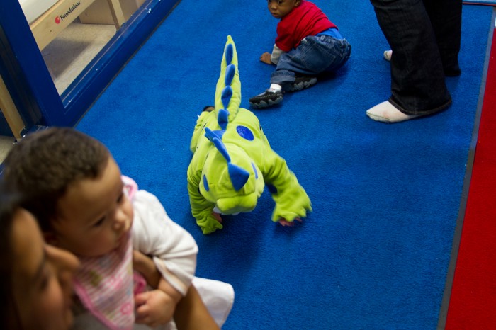 Eli crawling in his Dragon costume