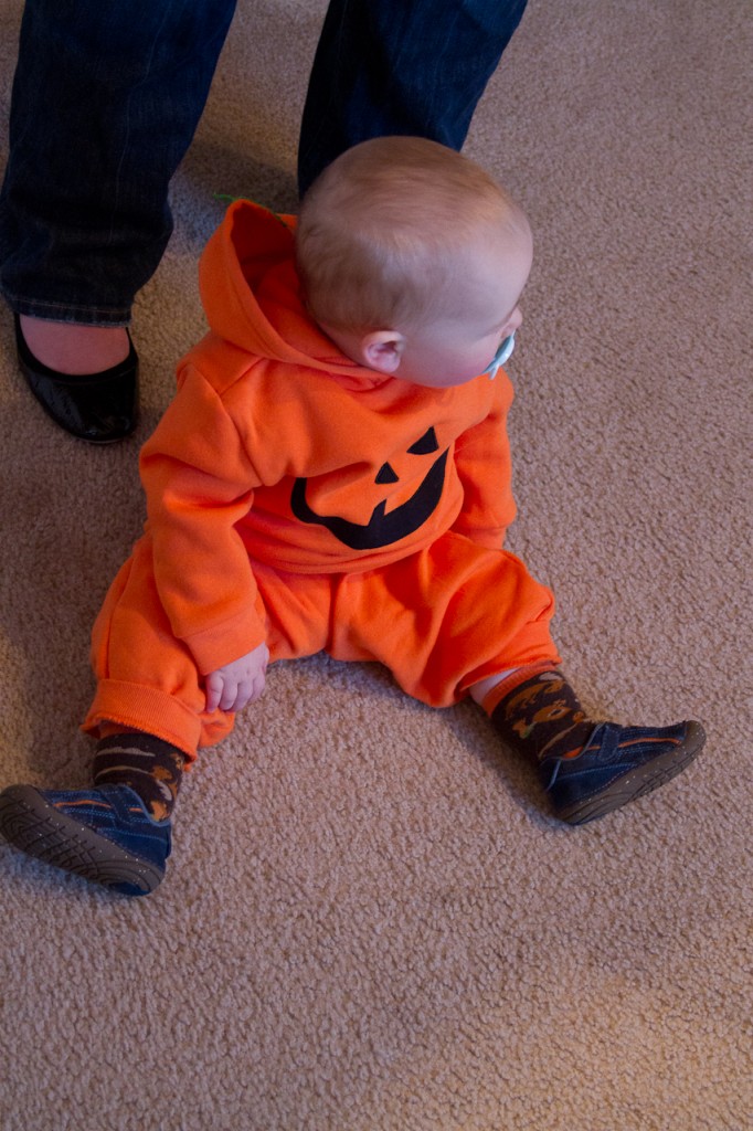 Eli sitting in his "alternate" pumpkin costume