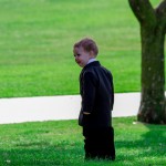 Eli pretends to be a tree.