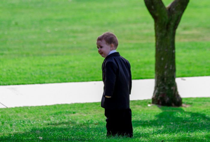 Eli pretends to be a tree.