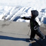 Eli throws a snowball